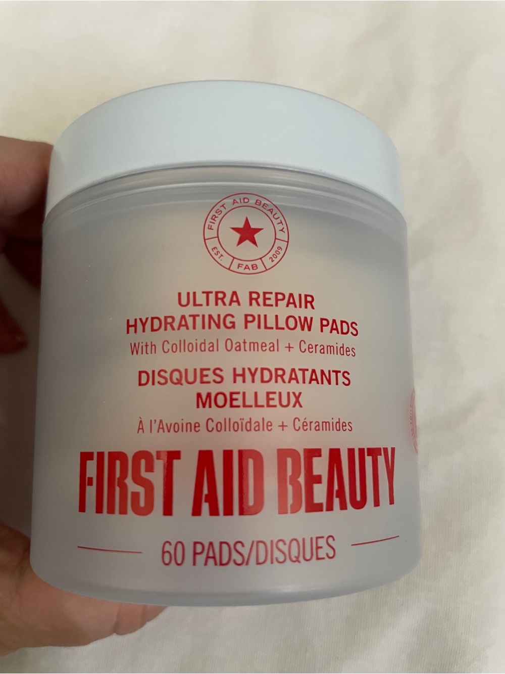 First Aid Beauty Ultra Repair Hydrating Pillow Pads - White with Red Text